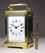 A 20th century carriage timepiece - with a corniche case and white enamel dial set out with Roman