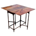 A late Goerge III mahogany spider leg drop leaf table - the rectangular top above turned supports