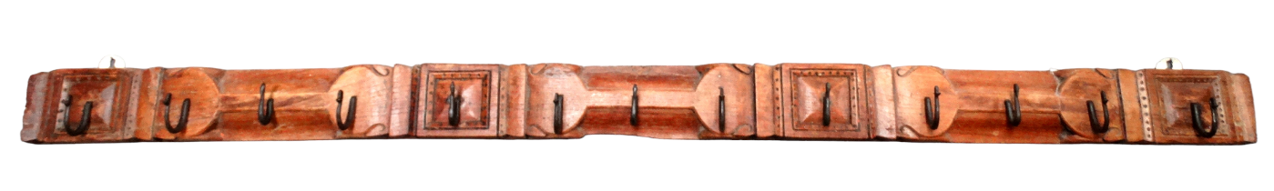 An Indonesian carved hardwood coat hook board - fitted with thirteen wrought steel hooks, length