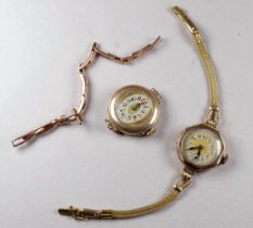 A 9ct yellow gold ladies wristwatch head - with an associated 9ct yellow gold sprung bracelet and