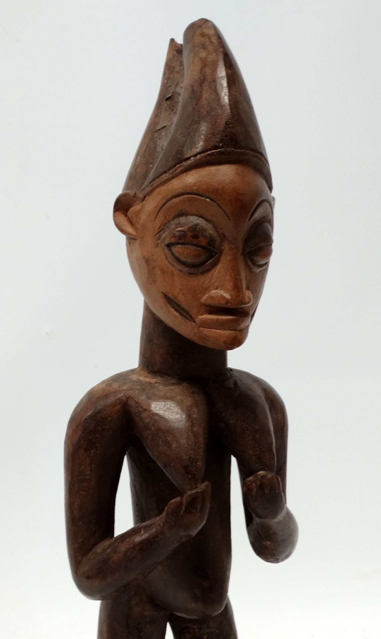 A Yoruba fertility figure - the standing female with bleached face and wearing a bifurcated hat, - Image 2 of 5