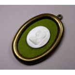 In the manner of James Tassie - opaque glass bas relief cameo of Agnes Wardlaw oval, 5 x 4cm.