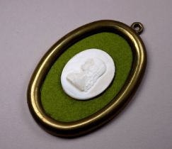 In the manner of James Tassie - opaque glass bas relief cameo of Agnes Wardlaw oval, 5 x 4cm.