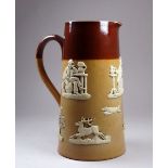 A Doulton Lambeth salt glazed stoneware jug - with applied decoration, to include drinkers, a