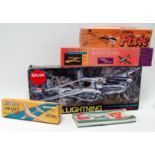 A scale balsa model kit of a Lockheed P-39 Lightning - boxed with instructions, together with four