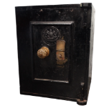 An early 20th century safe by C H Griffiths & Sons - with key, black painted with brass handle,