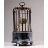 A 20th century novelty alarm clock by Kaiser - modelled as a bird cage in nickel and chrome,
