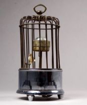 A 20th century novelty alarm clock by Kaiser - modelled as a bird cage in nickel and chrome,