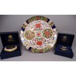 A Royal Crown Derby Imari plate - 'Garden' pattern with birds, diameter 22cm, together with two