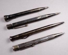 An early 20th century Yard-o-Lead silver propelling pencil - together with three other silver