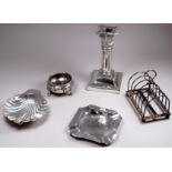 A silver candlestick - Sheffield 1891, James Dixon & Sons Ltd, the capital with foliate swags,