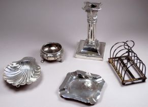 A silver candlestick - Sheffield 1891, James Dixon & Sons Ltd, the capital with foliate swags,