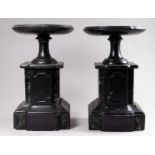 A pair of 19th black slate and green marble garniture - modelled as tazza on a stepped shaped stand,