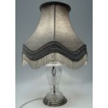 A clear cut glass table lamp - with gilt metal mounts, height 32cm.