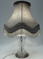 A clear cut glass table lamp - with gilt metal mounts, height 32cm.