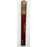 A 20th century mercury stick barometer - mounted on a mahogany panel with brassed scales.