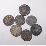 Seven French hammered coins.