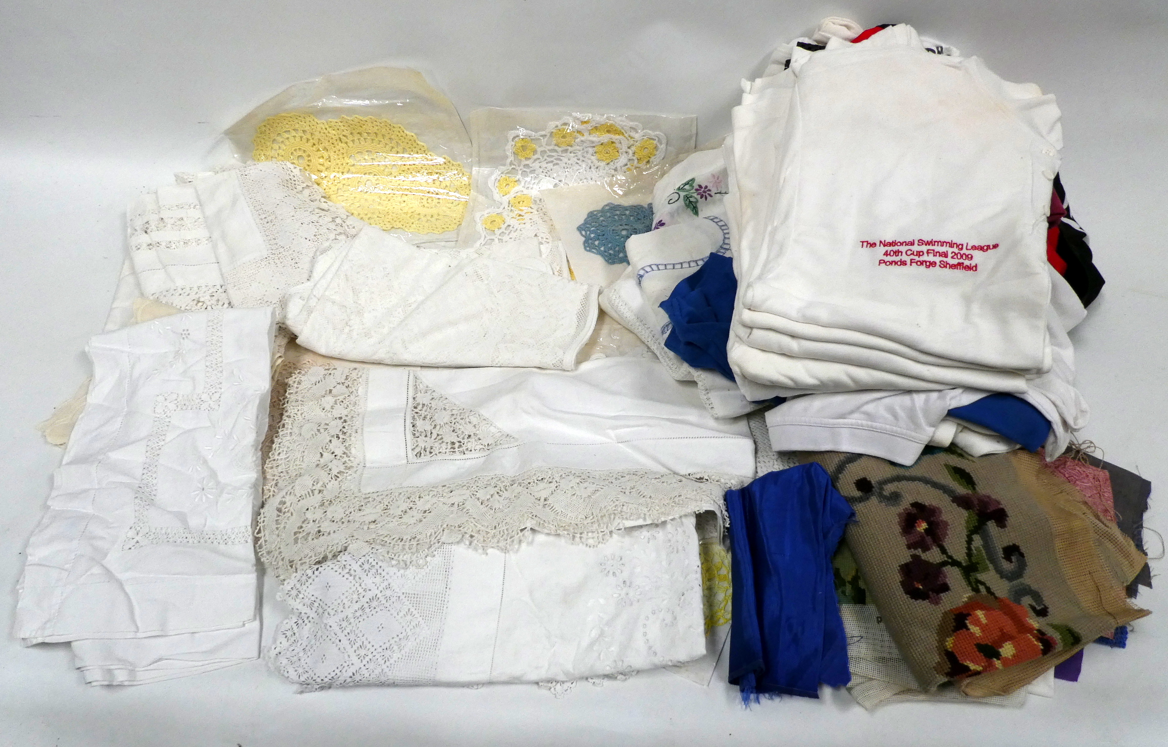 A quantity of 20th century lace and white-ware - together with a quantity of embroidered items. (