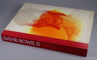 David Bowie Is Inside - published Victorian & Albert Museum, with hard covers and a cloth spine.