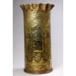 A WWI Trench Art brass vase - with planished decoration, frill neck and RAF engraved insignia,