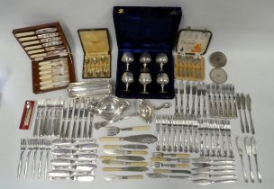 A quantity of silver plated wares - to include a ladle, a sauce boat, a sweetmeat dish, coasters and