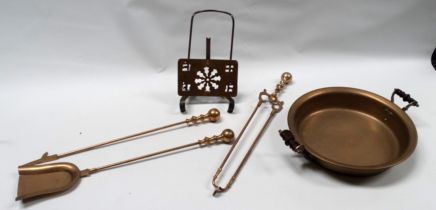 A 19th century pierced brass adjustable trivet - length 34cm, together with a set of three brass