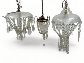 An early 20th century clear glass electrolier - with circular cut glass saucer and bag pendant,