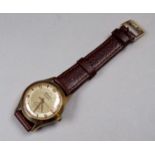 A Geneve gentleman's wristwatch - the silvered dial set out with Arabic numerals and batons, the