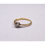 A solitaire diamond ring - the stone claw set in 9ct gold, size J/K, weight 1.2g.