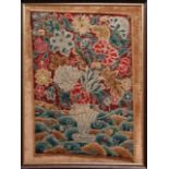 An 18th/19th century grosse and petit point embroidered panel showing a vase of summer flowers,