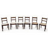 A set of six George IV provincial fruitwood rail back dining chairs - with solid contoured seats and