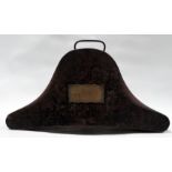 An early Victorian tin plate bicorn hat box - distressed black japanned finish with a vacant brass