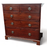 A 19th century mahogany chest of drawers - the rectangular top above an arrangement of two short and
