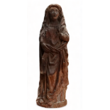 An 18th century German carved oak figure of Madonna - height 65cm.