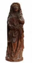 An 18th century German carved oak figure of Madonna - height 65cm.