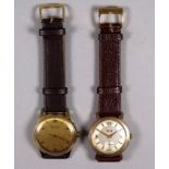An Optima gentleman's wristwatch - the gilt dial set out with Arabic numerals and dots, within a