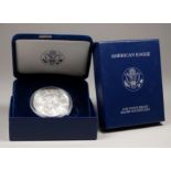 An American Eagle 2002 one ounce proof fine silver bullion coin - in blue velvet case and boxed.