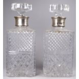 A pair of cut glass and silver mounted decanters - Brimingham 1980, C J Vander Ltd, square with