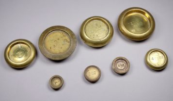 Eight various 19th century brass weights - of Imperial measurement.