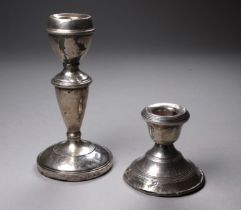 A silver candlestick - Birmingham 1962, John Rose, height 11.8cm, together with another smaller