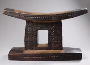 A tribal Zulu headrest Natal, South Africa - with carved zig zag decoration, height 15.5cm, length