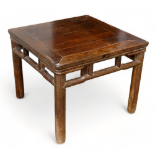 A late 19th century Chinese hardwood square low table - bearing remnants of wax export seal, cleated