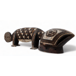 An African carved hardwood polychrome painted gecko - length 90cm.