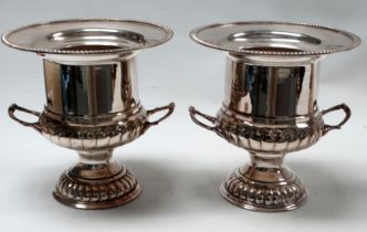 A pair of campana style silver plated wine coolers - with separate liners, height 25cm.