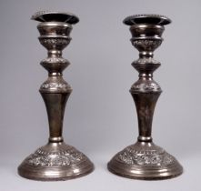 A pair of silver candlesticks - Brimingham 1967, W I Broadway & Co, of baluster form with foliate