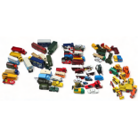 A quantity of Corgi and Dinky vehicles - together wtih some other makes, mostly commercial,