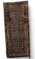 Probably Senufo, Ivory Coast wooden door - extensively carved with figures and animals, width