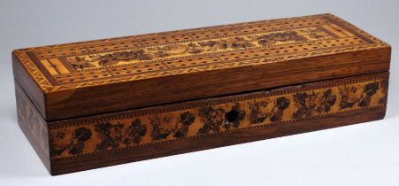 A mid 19th century Tunbridgeware games box and cribbage board, the rectangular box decorated with