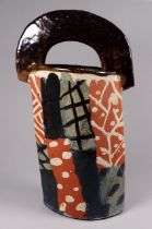 John MALTBY (British 1936-2020) slab sided pottery vase - circa 1990, of navette form with a hoop