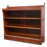 A late Victorian walnut Aesthetic Movement open bookcase - with two adjustable shelves, width 122cm,